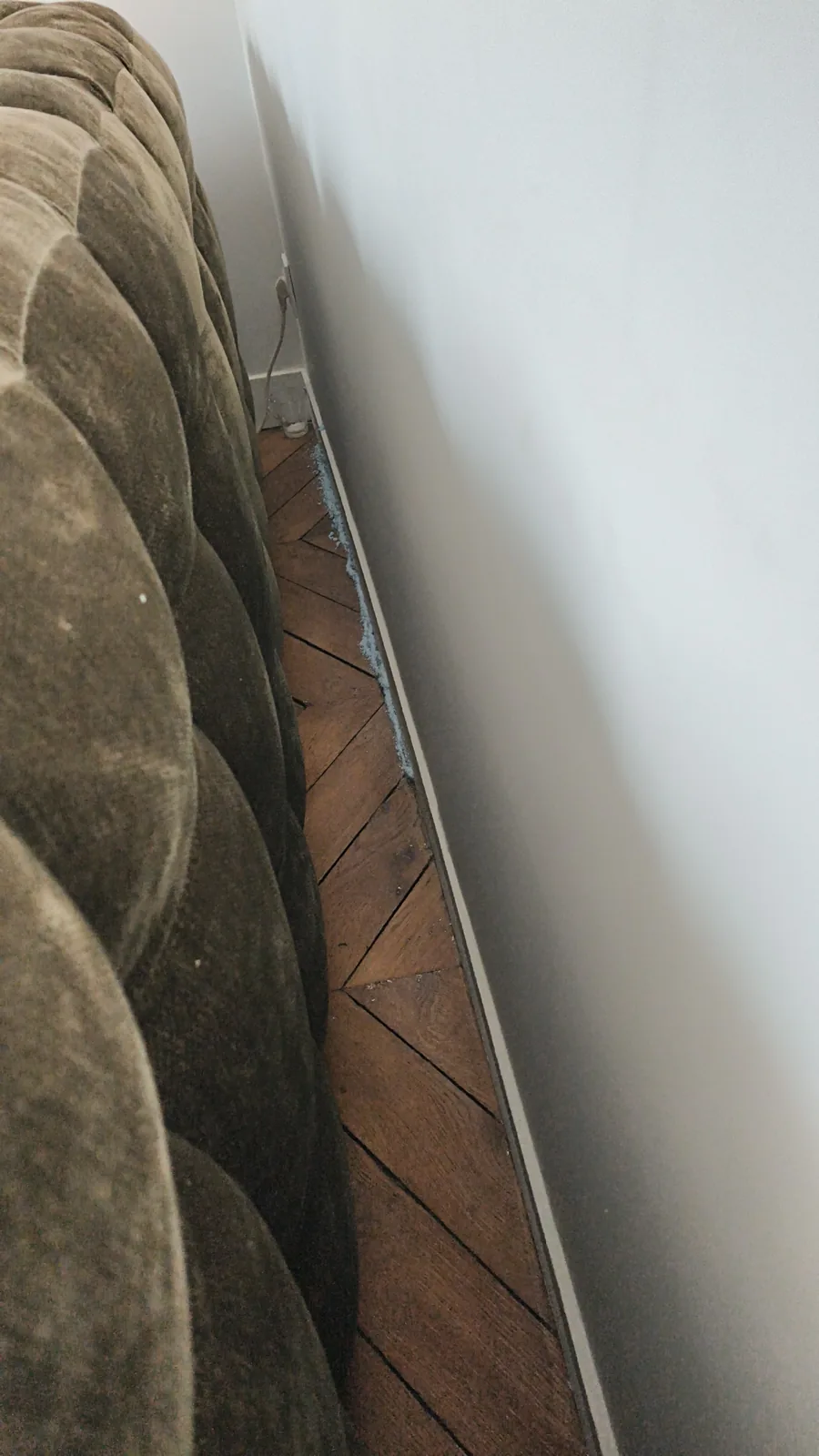 Cordon of contact rodenticide along a bedroom skirting board on a mouse run, ODF job in Paris 4e